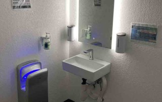 Touchless- soap dispenser, faucet, hand dryer in bathroom
